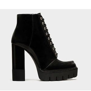 Lace up high heel ankle boots with track soles